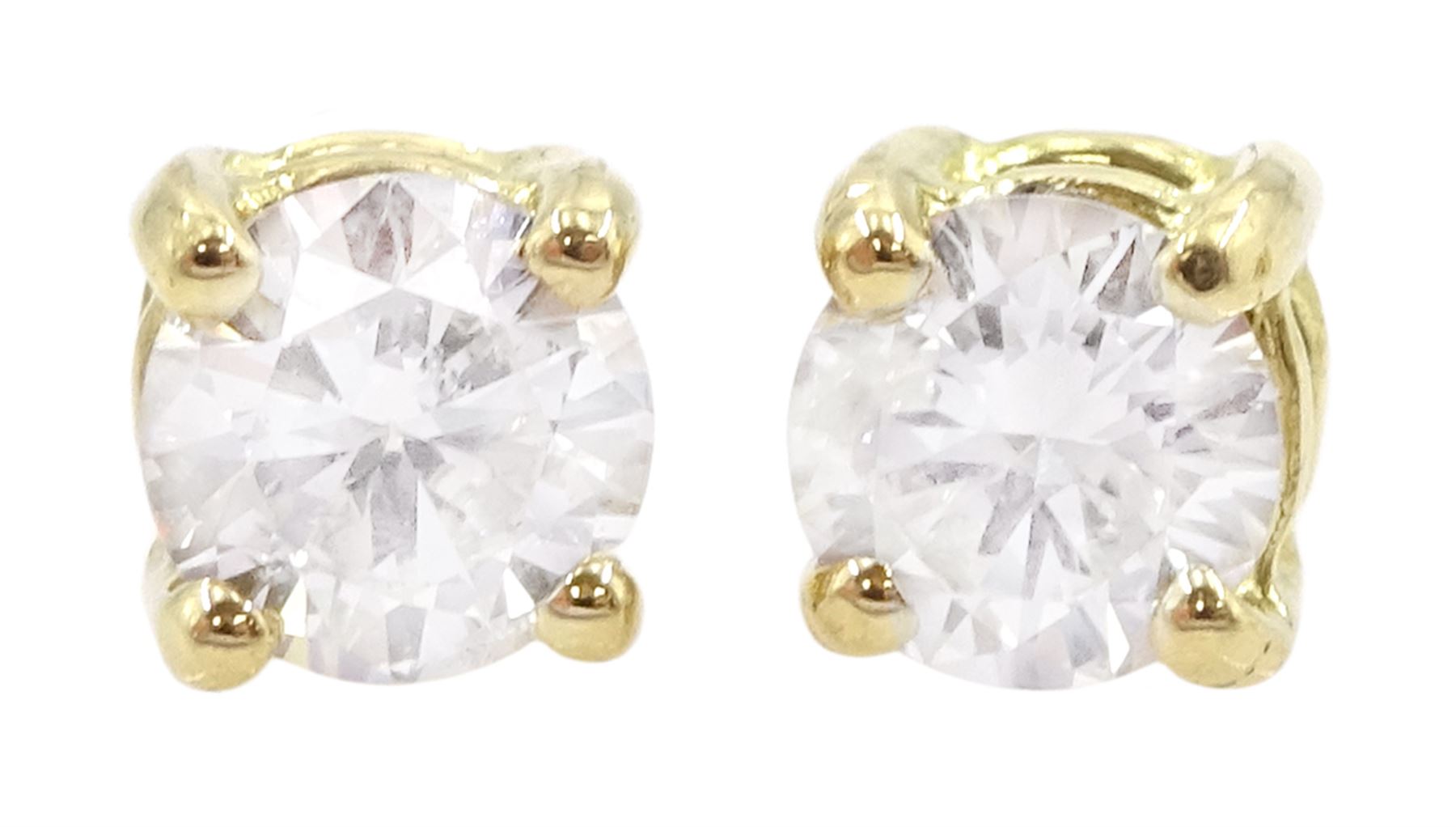 Pair of 18ct gold round brilliant cut diamond stud earrings