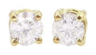 Pair of 18ct gold round brilliant cut diamond stud earrings