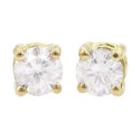 Pair of 18ct gold round brilliant cut diamond stud earrings