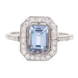 White gold milgrain set emerald cut aquamarine and diamond cluster ring