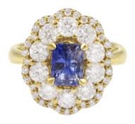 18ct gold radiant cut Ceylon sapphire and round brilliant cut diamond cluster ring