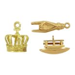 Three 18ct gold charms including crown