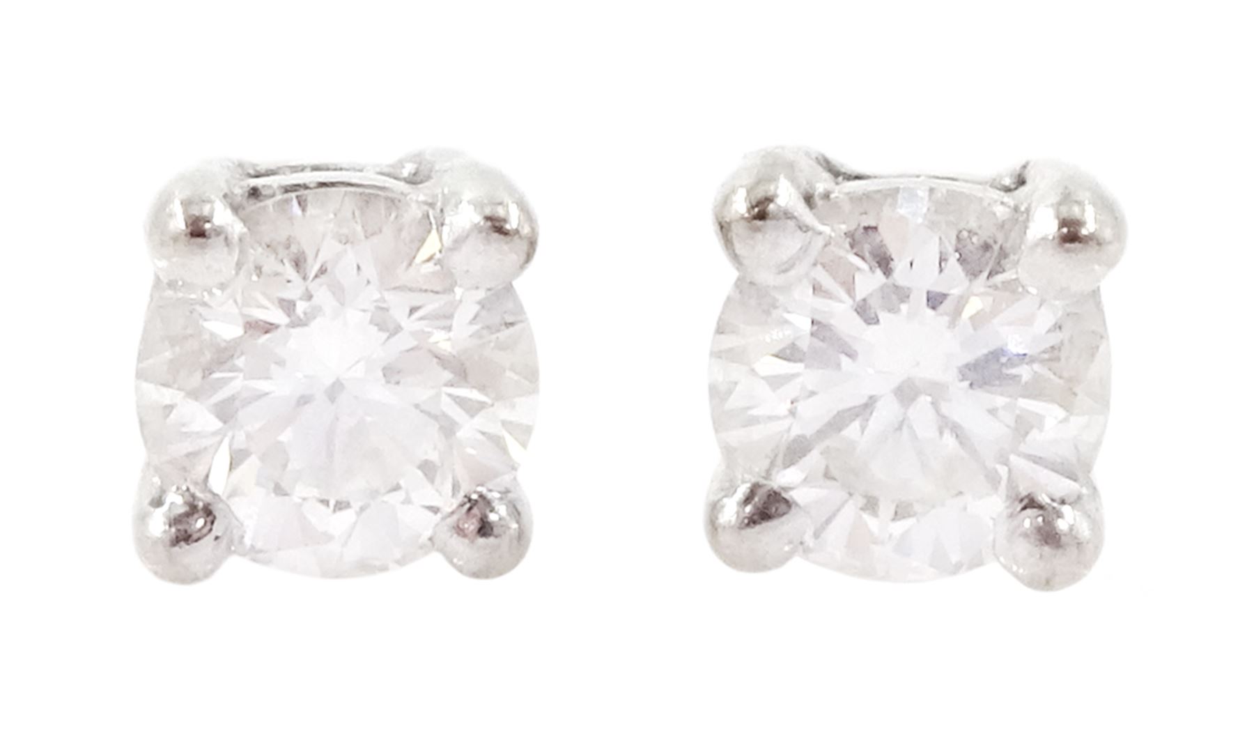 Pair of 18ct white gold round brilliant cut diamond stud earrings