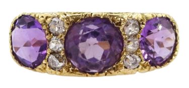 Dutch gold three stone round cut amethyst and six old cut diamond ring