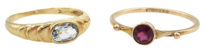 Early-mid 20th century 9ct gold single stone garnet ring and a later 9ct gold single stone aquamarin