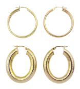 Two pairs of 9ct gold hoop earrings