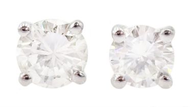 Pair of 18ct white gold round brilliant cut diamond stud earrings