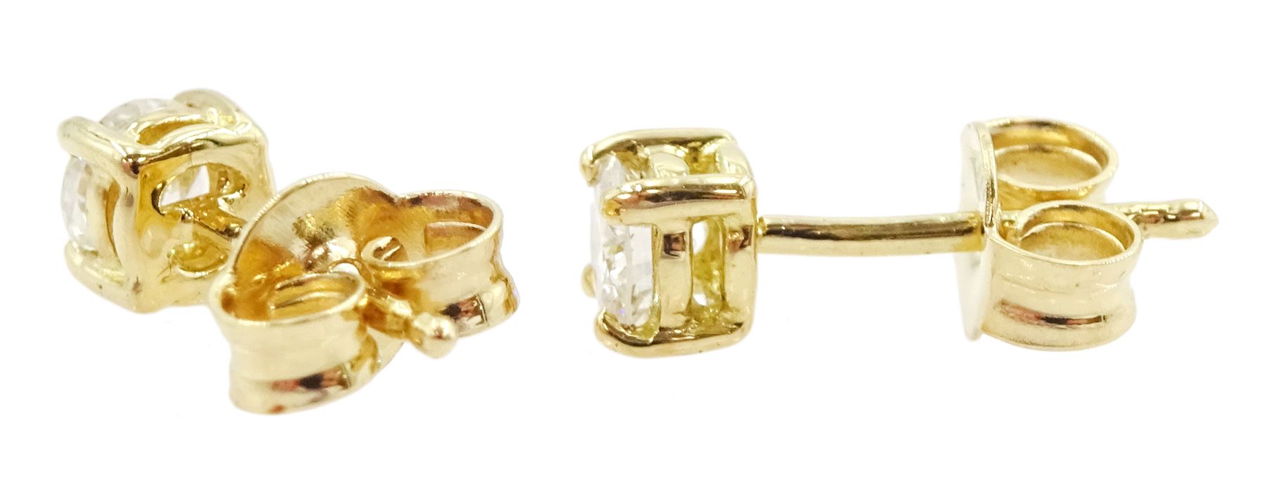 Pair of 18ct gold round brilliant cut diamond stud earrings - Image 2 of 2