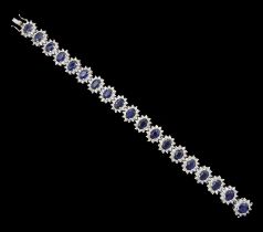 18ct white gold oval cut sapphire and round brilliant cut diamond bracelet