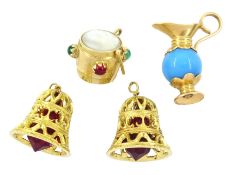 Three 18ct gold stone set pendant / charms including two bells and a jug and a 14ct gold mother of p