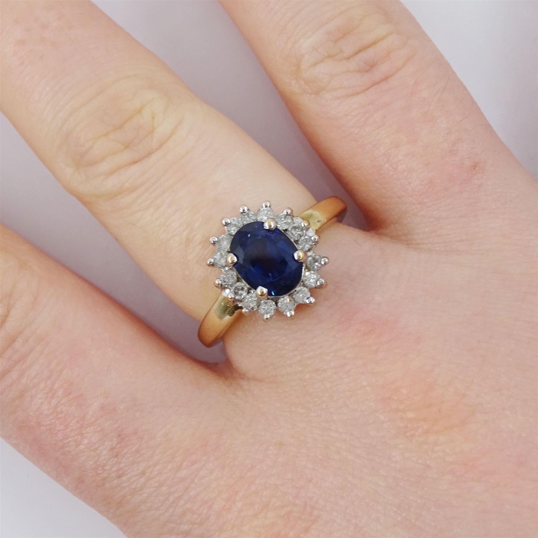 9ct gold oval cut sapphire and round brilliant cut diamond cluster ring - Image 2 of 4