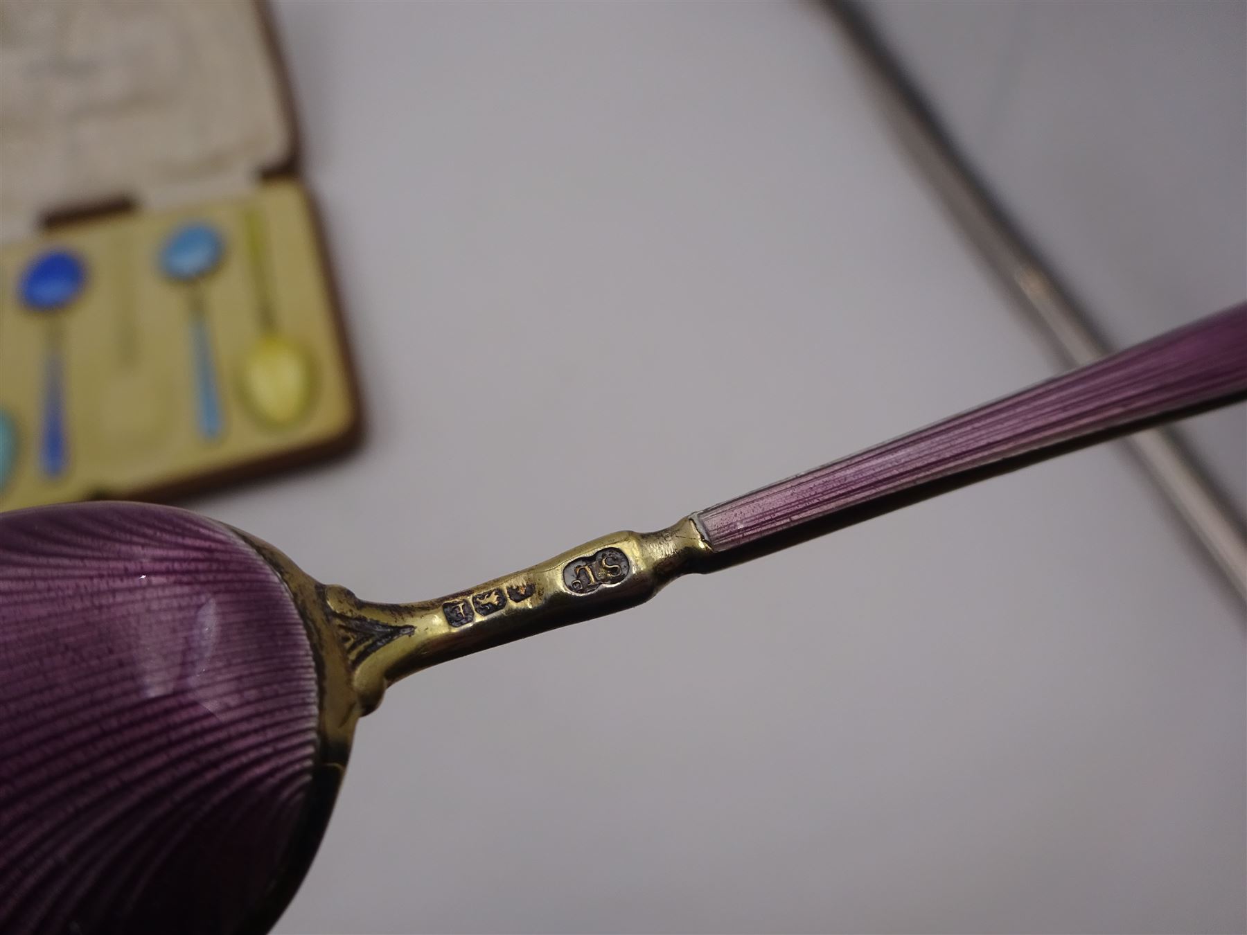 Set of six 1920s silver-gilt and harlequin enamel coffee spoons - Image 4 of 6