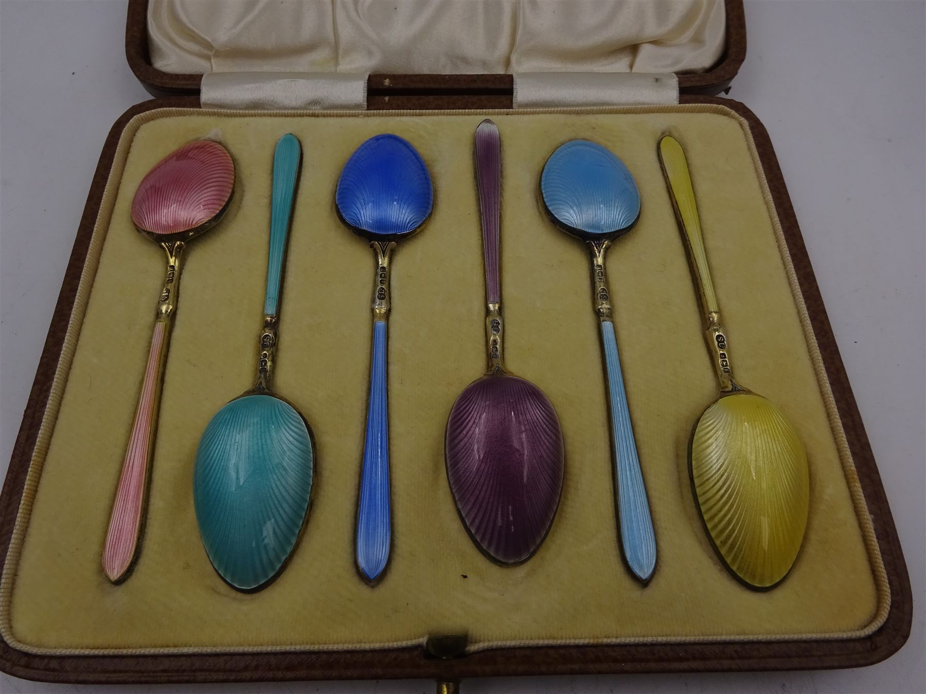 Set of six 1920s silver-gilt and harlequin enamel coffee spoons - Image 2 of 6