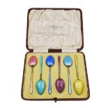 Set of six 1920s silver-gilt and harlequin enamel coffee spoons