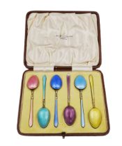 Set of six 1920s silver-gilt and harlequin enamel coffee spoons