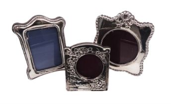 Three modern Britannia silver mounted photograph frames