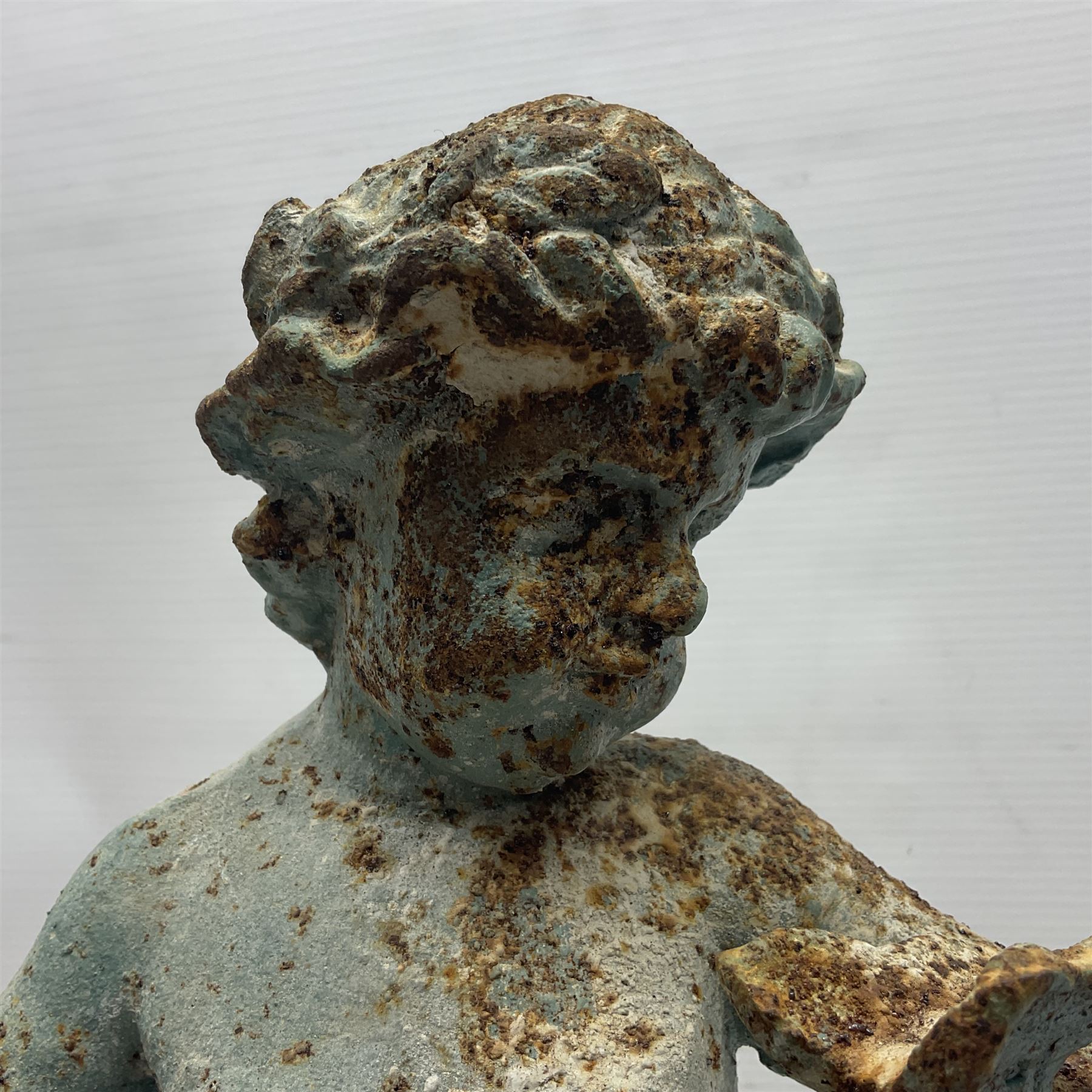 Garden ornament modeled as a putti with butterfly - Image 2 of 7