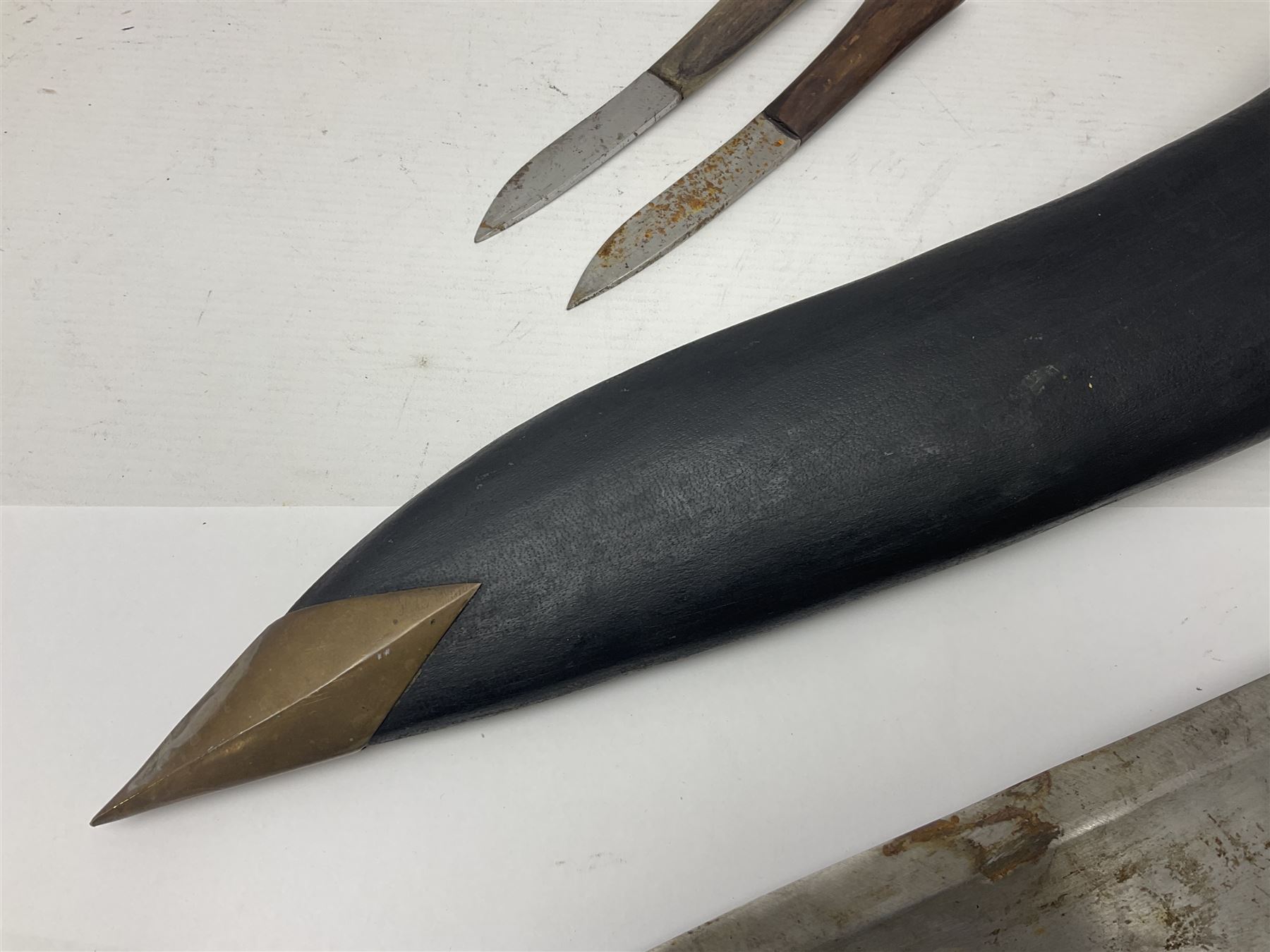 Gurkha Kukri knife with 53cm curving steel blade and wooden handle; in leather covered scabbard with - Image 10 of 17