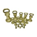 Set of seventeen Victorian brass bell weights