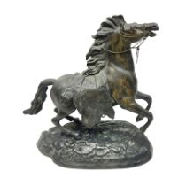 Bronzed figure of a galloping horse