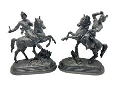 Pair of spelter warriors on horseback