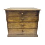 Oak tabletop chest with four drawers