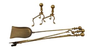 Pair of brass fire dogs and fire accessories