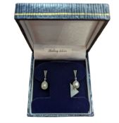 Pair of silver pearl and marcasite pendant stud earrings