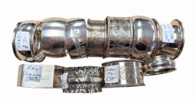 Eleven silver napkin rings