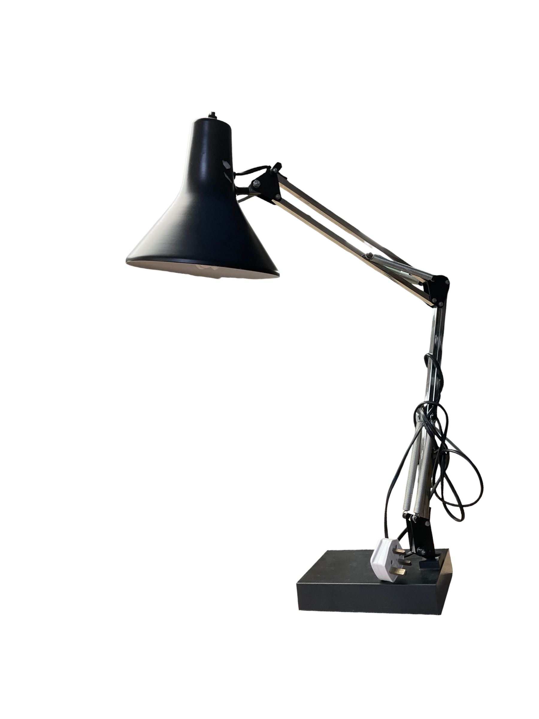 Angle poise style lamp upon a rectangular base