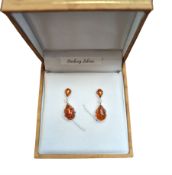 Pair of silver Baltic amber pendant stud earrings