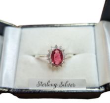 Silver cubic zirconia and pink/red stone cluster ring
