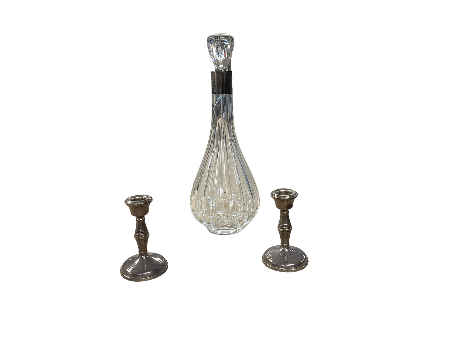 Silver collar decanter together with two silver candlesticks