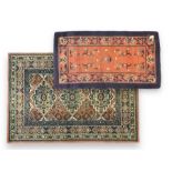 Persian design peach ground rug (169cm x 117cm); Chinese peach ground rug (187cm x 101cm)