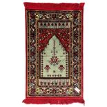 Turkish crimson and light blue ground prayer rug