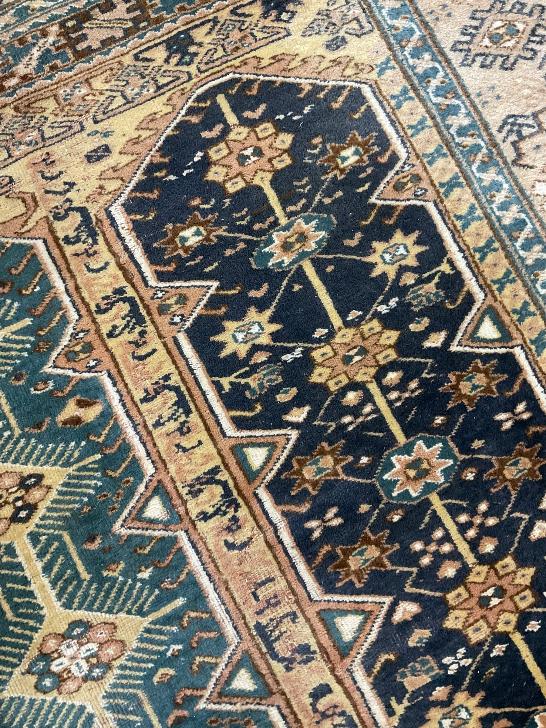 Small Persian red and blue ground rug (115cm x 88cm); and a Persian beige ground rug with two elonga - Image 2 of 12