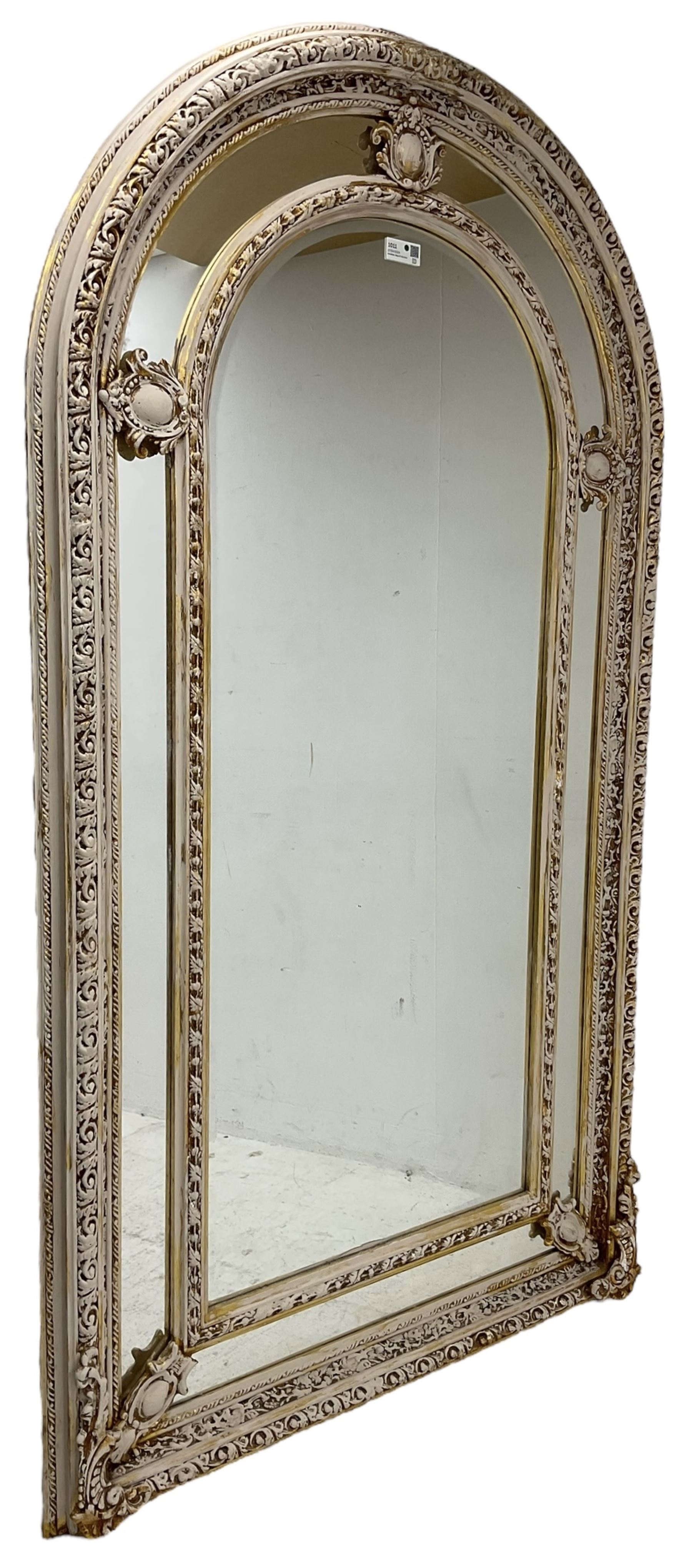 Large painted and gilt arched wall mirror