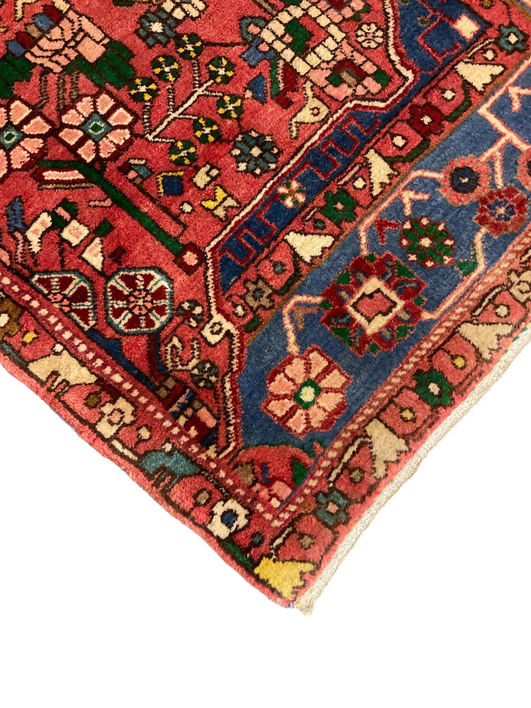 Small Persian red and blue ground rug (115cm x 88cm); and a Persian beige ground rug with two elonga - Image 7 of 12