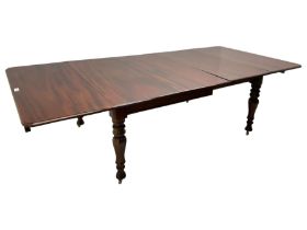19th century mahogany extending dining table with three additional leaves