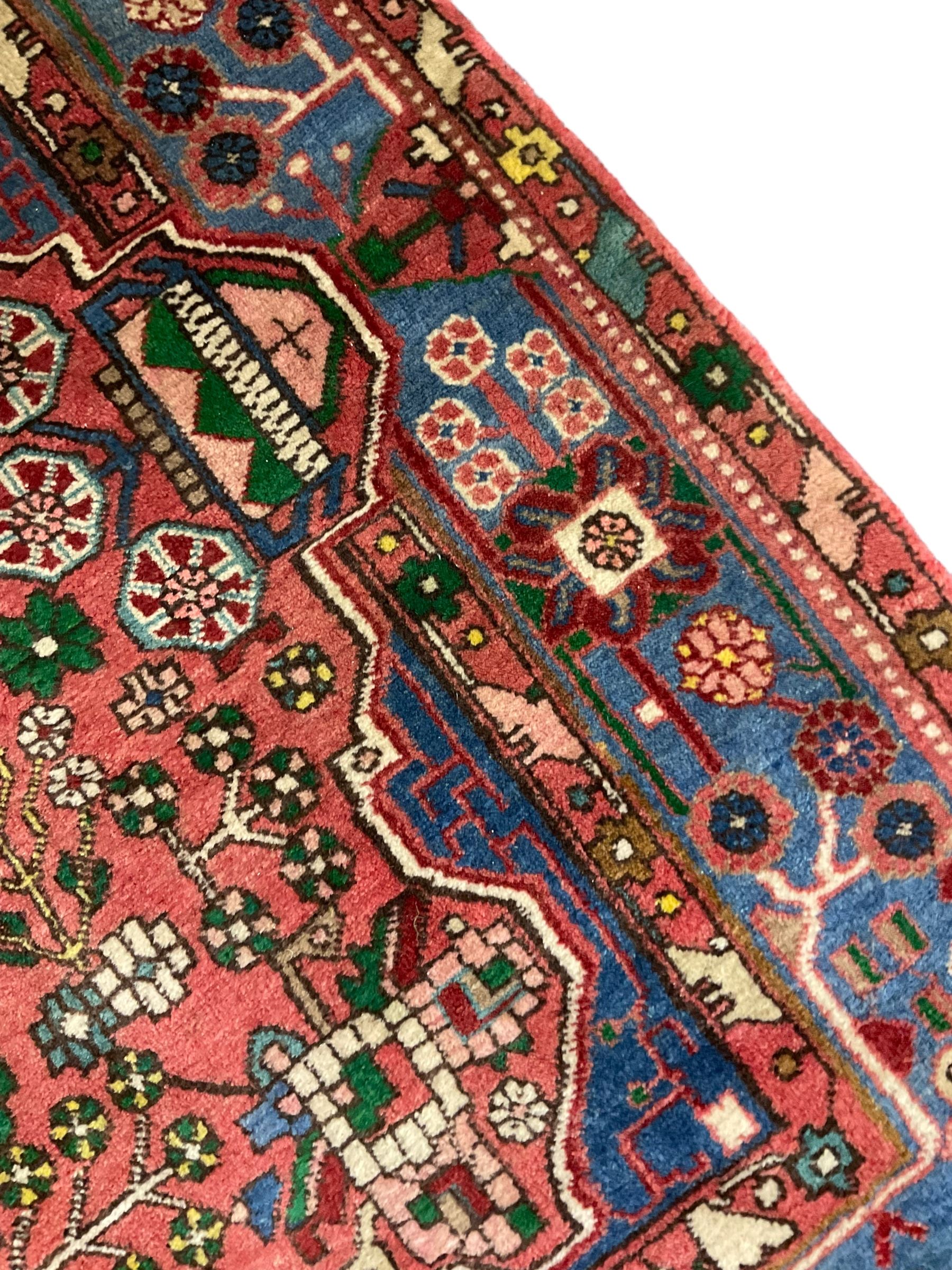 Small Persian red and blue ground rug (115cm x 88cm); and a Persian beige ground rug with two elonga - Image 8 of 12