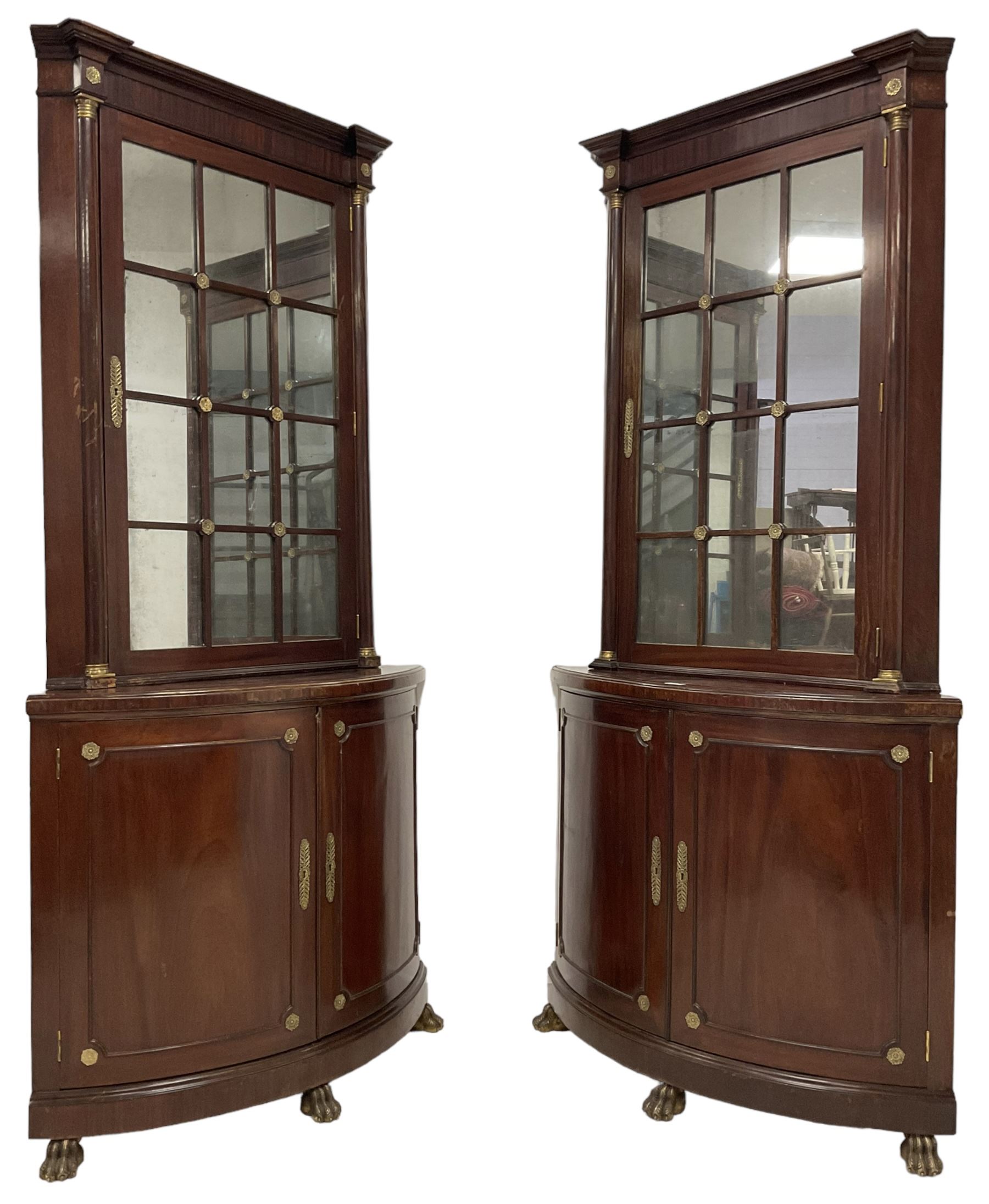 Pair of French Empire design corner cabinets