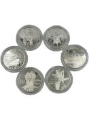 Six United States of America silver one dollar coins