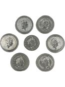 Seven Queen Elizabeth II one ounce fine silver two pound coins