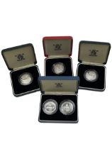 Four The Royal Mint United Kingdom silver proof two pound coins or sets