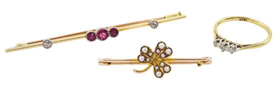 Early 20th century 18ct gold three stone garnet and two stone old cut diamond brooch