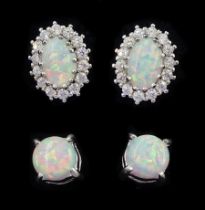 Pair of silver opal and cubic zirconia stud earrings and one other pair of opal stud earrings