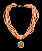 Six strand coral bead necklace
