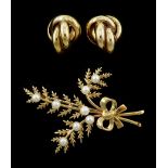 Gold pearl flower brooch and a pair of gold knot stud earrings