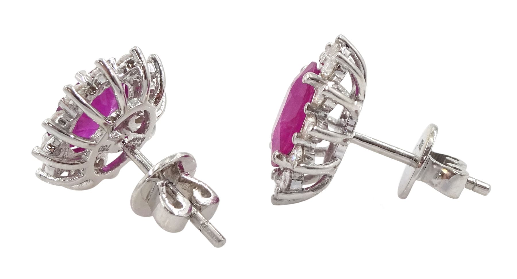 Pair of 18ct white gold oval cut ruby and round brilliant cut diamond cluster stud earrings - Image 2 of 2