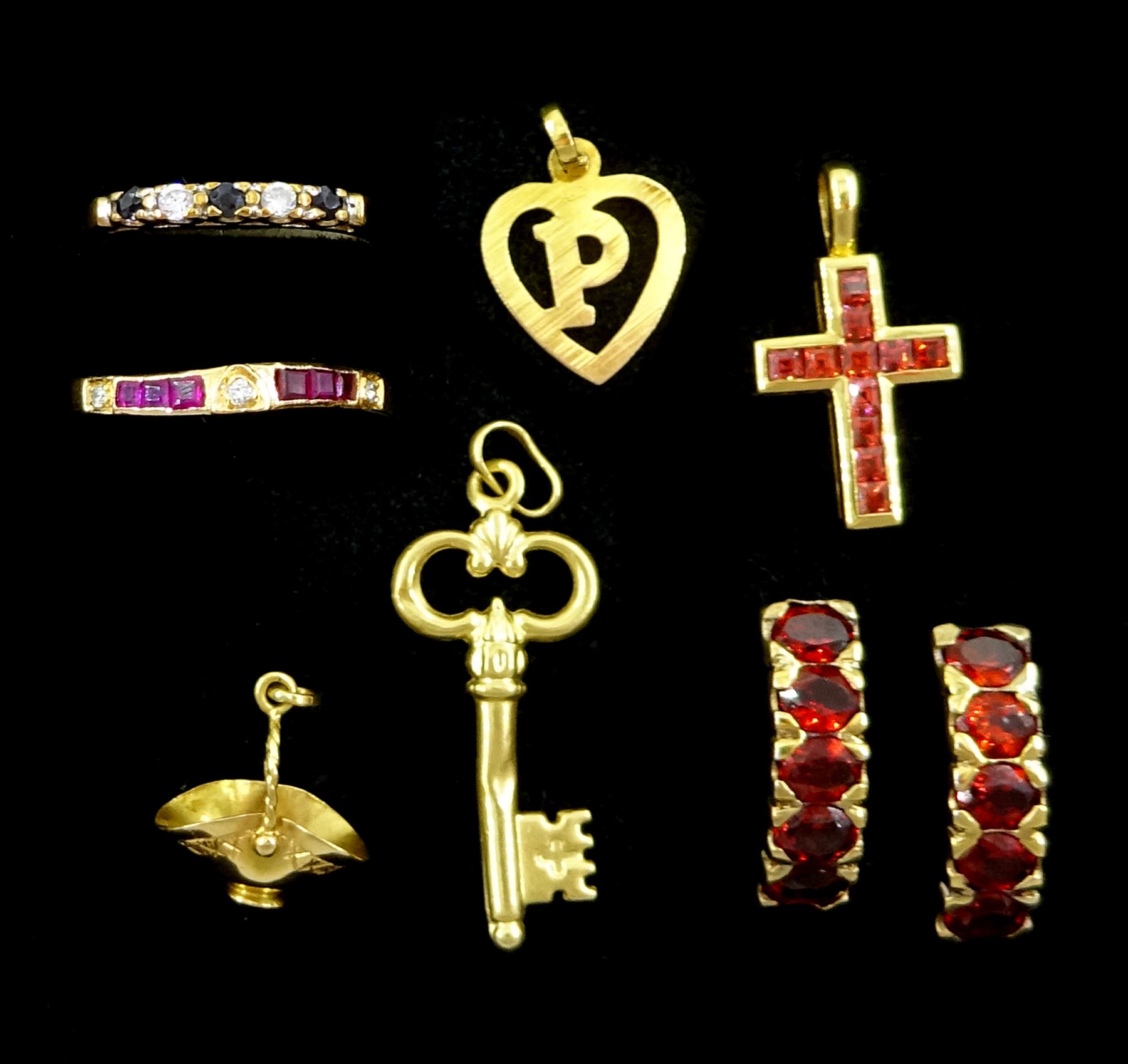 Gold garnet cross pendant